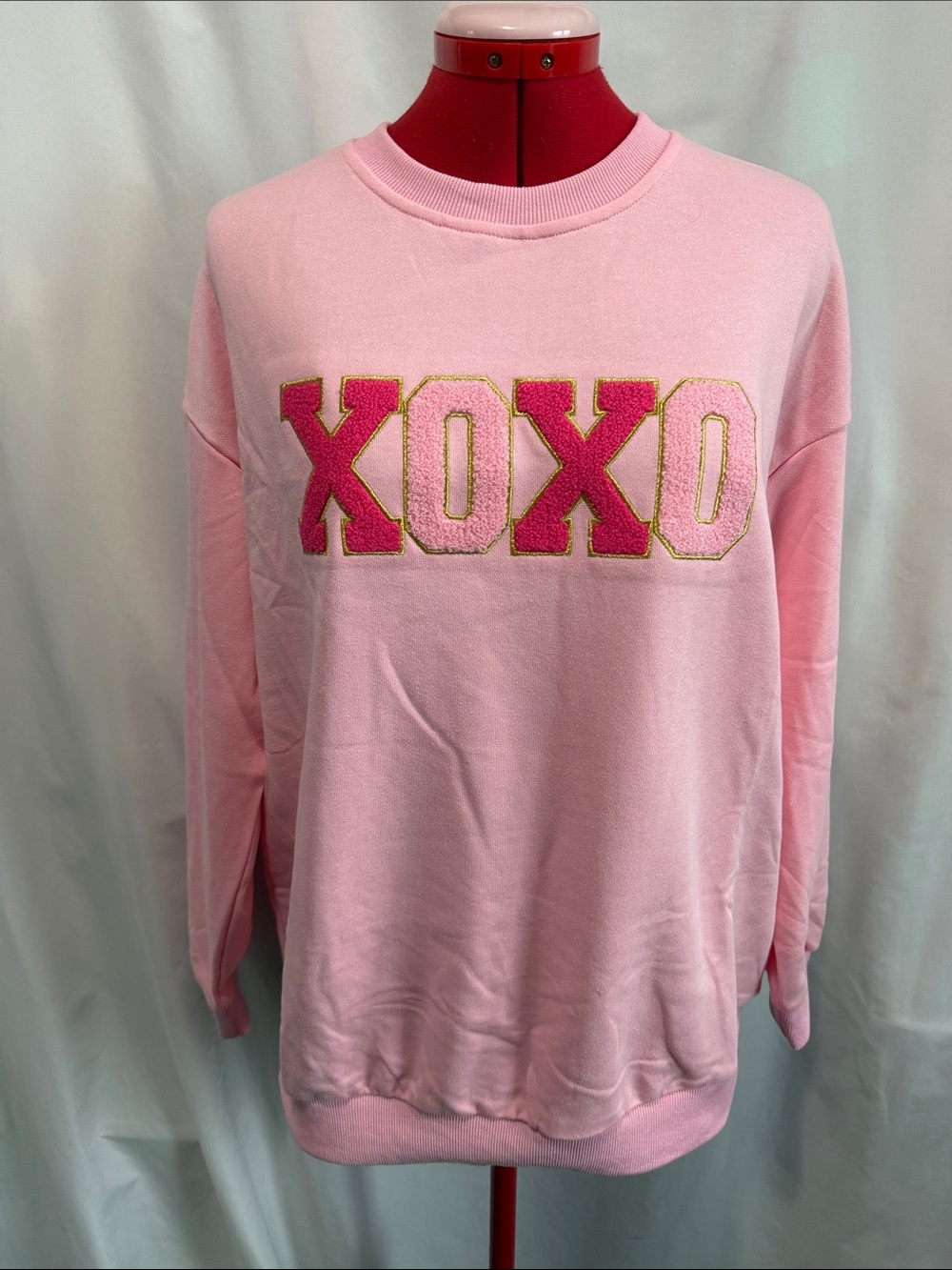 XOXO Pink Crewneck Sweatshirt with Gold-Edged Lettering